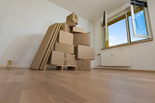 Boxes and furniture being loaded for removals in Bromleycommon