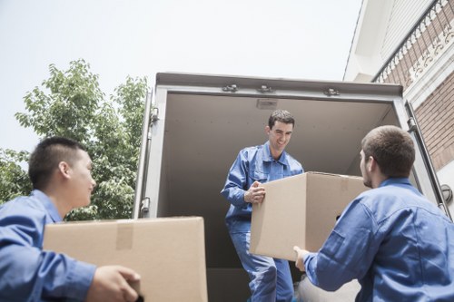 Careful wrapping and organised box preparation for relocation