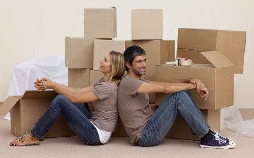 Unpacking boxes into a new Bromleycommon property room by room
