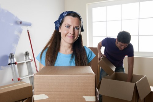 Removal team handling furniture for a flat move in Bromleycommon
