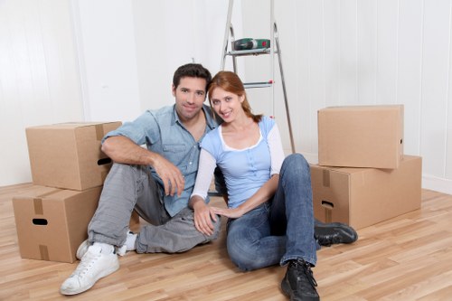 Van loading scene showing careful handling of household goods