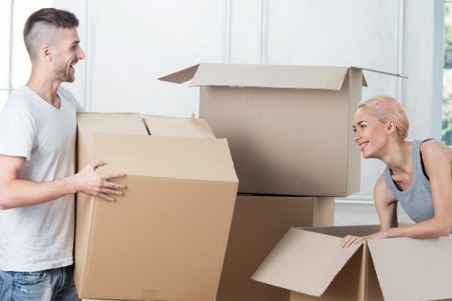 Packing boxes and moving items for a local home or flat removal