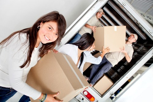 Commercial moving vehicle and staff managing access in Bromleycommon