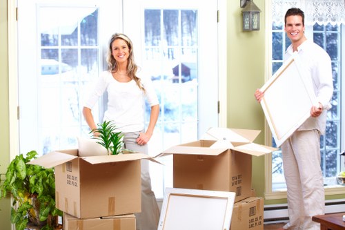 Careful loading of unwanted furniture during a Bromleycommon collection